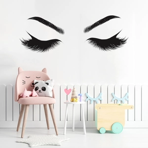 Black eyelash and eyebrow vinyl wall decal for a stylish minimalist bedroom decoration