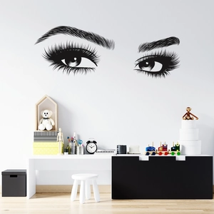 Detail of minimalist black vinyl wall sticker featuring female eyes with long lashes