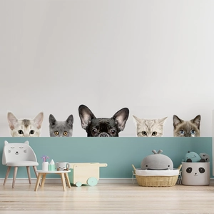 Detailed view of five 3D cat and dog wall stickers in a cozy minimalist children's room decor