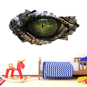 Detail of 3D broken wall sticker showing a realistic dinosaur eye and scaly skin texture