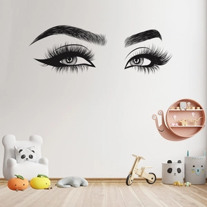 Detail of self-adhesive vinyl wall sticker featuring stylish female eyes and long lashes