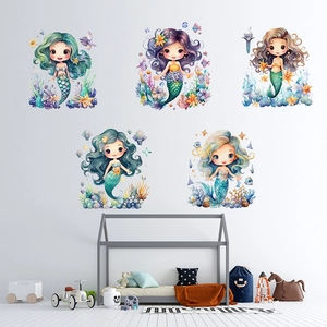 Detail of five watercolor mermaid wall stickers with coral and fish in a nursery setting