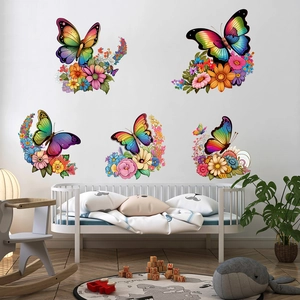 Detail showing five sets of colorful butterfly and floral wall decals for home decoration