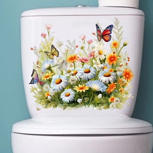 Détail de stickers muraux floraux adhésifs avec marguerites et papillons sur surface