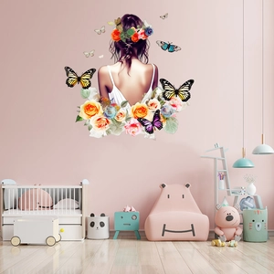 Detail of floral butterfly girl wall sticker in a cozy nursery room setting