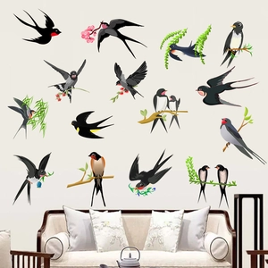 Detail of bird wall stickers with swallows and willow branches in a modern living room