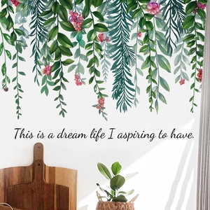 Green hanging leaves and red berries wall decal for a modern minimalist home decor
