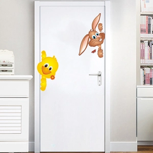 Detail of 3D cartoon duck and rabbit wall stickers on a white interior door for kids rooms