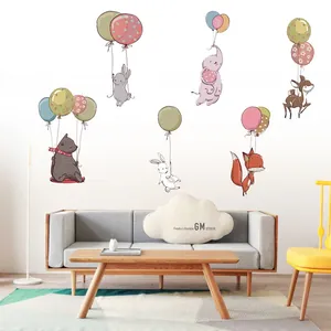 Nursery wall stickers set featuring cartoon forest animals in colorful hot air balloons