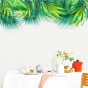 Tropical green palm and banana leaf wall stickers for a modern home interior decoration