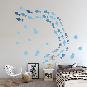 Blue fish wall decals shown in a minimalist Nordic bedroom with soft lighting