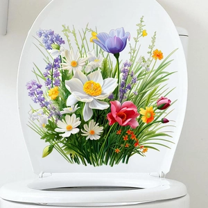 Gros plan de stickers floraux avec marguerites et lavande sur un abattant de WC