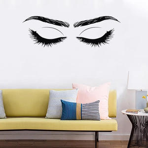 Minimalist black eyelashes and eyebrows wall decal for modern living room decor