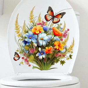 Détail d'un autocollant pour toilettes avec motifs de fleurs colorées et de papillons
