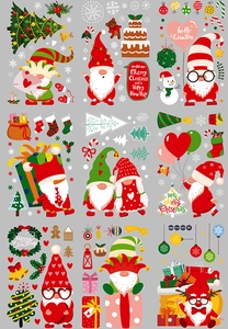 Close-up of Christmas window stickers featuring Gnomes, trees, and holiday stationery items
