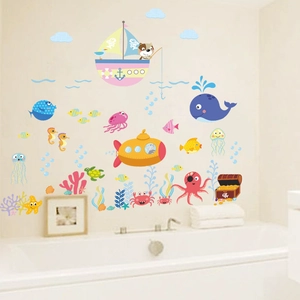 Detail of ocean wall stickers with cartoon whale and submarine in a kids bathroom