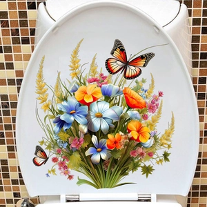 Détail d'autocollant floral pour abattant WC avec fleurs colorées et papillons