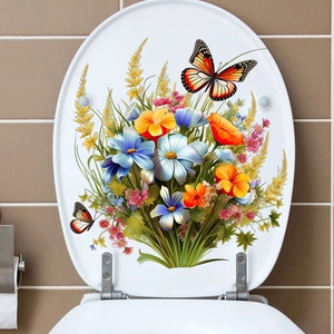 Vue détaillée de stickers autocollants papillons et fleurs sur un couvercle de toilette blanc