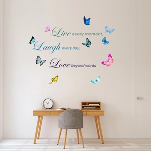 Close-up of colorful butterflies and motivational Live Laugh Love vinyl wall decals