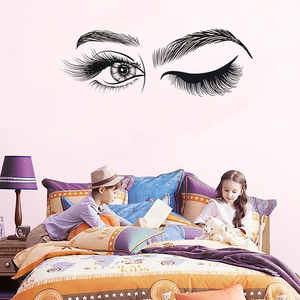 Eyelash wall decals featuring open and winking eyes for bedroom wall decoration