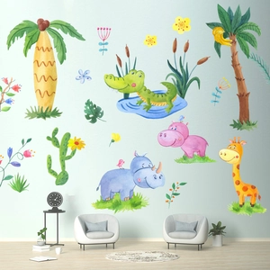 Detail of watercolor jungle animals wall decals on a light teal background