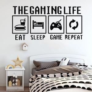 Black 'THE GAMING LIFE' wall decal featuring eat sleep game repeat icons on white wall