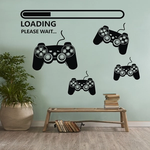 Detail of gamer wall decals featuring controller silhouettes and loading bar progress text