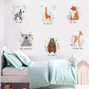 Detail showing hand-painted watercolor animal wall decals with inspirational English quotes