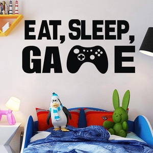 Detail of Eat Sleep Game wall decal featuring a gaming controller icon in a kids room