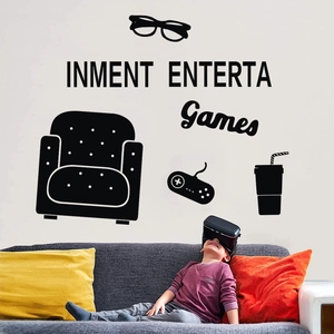 Detailed view of black vinyl wall decals featuring game controller and beverage silhouettes