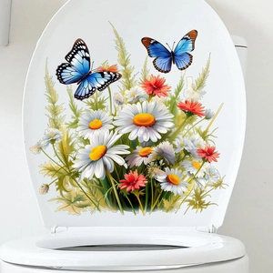 Détail de l'autocollant floral pour abattant WC avec papillons bleus et marguerites blanches