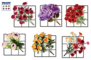 Detailed grid display of colorful artificial flower bouquets on black metal mesh panel