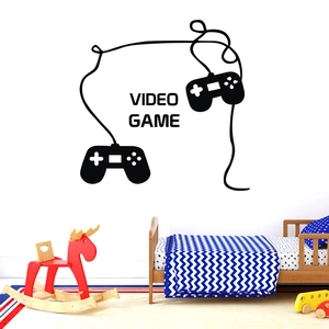 Black video game controller wall sticker silhouette in a bright child's bedroom setting