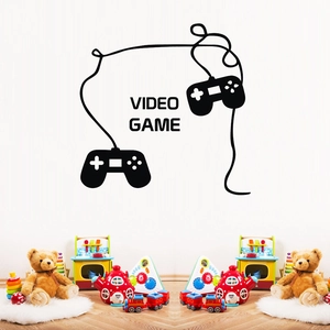 Detail view of black vinyl video game controller wall sticker on a white bedroom wall