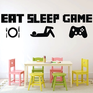 Detail of Eat Sleep Game wall decal applied on white wall in a modern colorful kids room