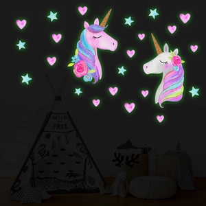 Luminous unicorn wall stickers with glowing hearts and stars for nursery decor
