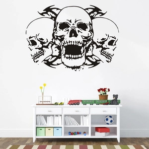 Minimalist black vinyl skull wall decal with tribal patterns for living room decor