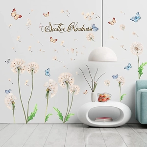 Dandelion and butterfly wall sticker with Scatter Kindness text in modern living room