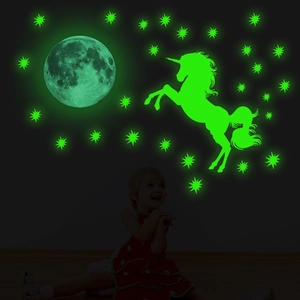 Luminous wall stickers featuring a moon, unicorn, and stars for kids' bedroom decor