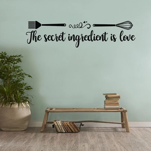 Minimalist kitchen wall sticker with ‘The secret ingredient is love’ text and utensils