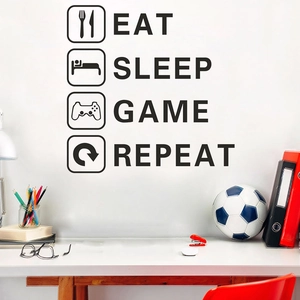 Sticker mural Eat Sleep Game Repeat pour chambre de garçon avec icônes de jeu