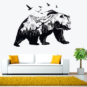 Modern wall sticker featuring a bear silhouette with a mountain landscape forest design