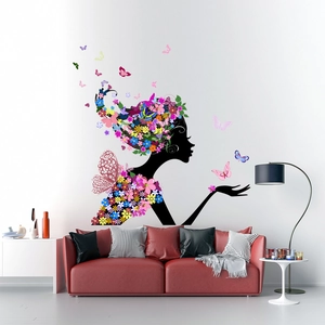 Artistic flower fairy and butterfly wall sticker decorating a modern living room setting