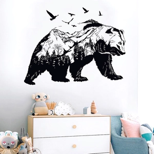 Detailed bear silhouette wall decal with forest and mountain pattern in a nursery room