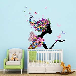 Artistic flower fairy wall decal with colorful butterflies for a nursery room decoration