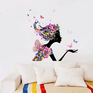 Detailed wall sticker view of colorful flowers and butterflies in a female silhouette