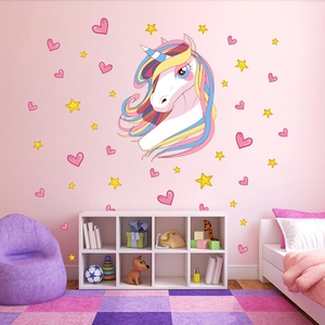 Unicorn wall stickers with stars and hearts for children room decor in soft pink setting