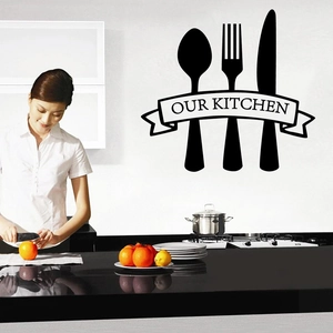 Detail of Our Kitchen black vinyl wall decal with cutlery silhouettes in a home setting