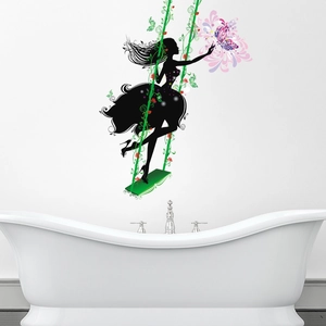 Artistic wall sticker featuring a woman on vine swing with a large purple butterfly