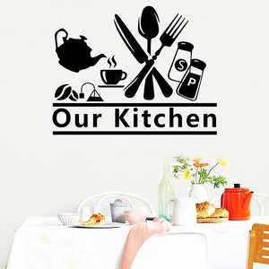 Close-up of 'Our Kitchen' removable vinyl wall decal with cutlery and coffee cup silhouettes